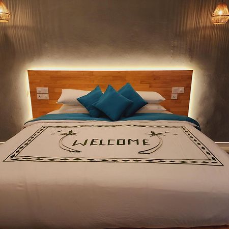 DHIGURAH BEACH Inn Bagian luar foto