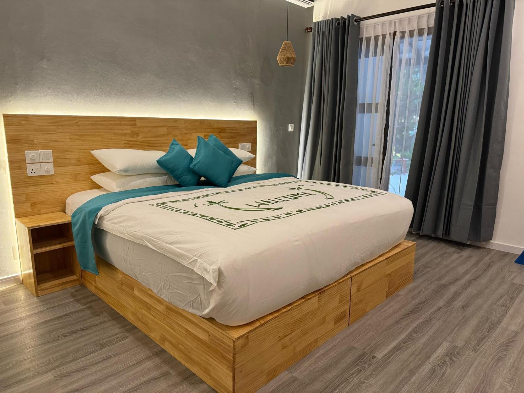 DHIGURAH BEACH Inn Bagian luar foto